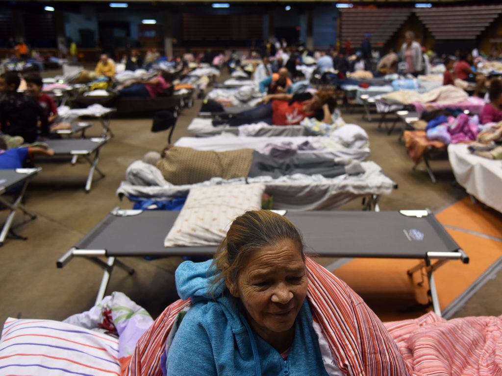 Puerto Ricans take refuge ahead of Hurricane Maria in the Clemente Coliseum in San Juan on Sept. 19.