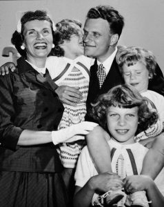 Graham met his wife, Ruth McCue Bell (1920-2007), while both were classmates at Wheaton College. They married two months after their graduation and went on to have five children. Clockwise from left: Ruth Graham, Anne, Billy Graham, Ruth (Bunny) and Virginia.