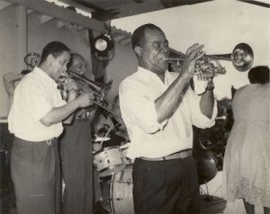 Louis Armstrong playing trumpet