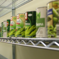 Cans sit unused on the shelves of the Baker University Center Food Pantry