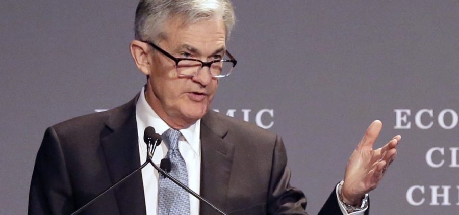 Federal Reserve Chairman Jerome Powell speaks before the Economic Club of Chicago on April 6. For the second time this year, the central bank is expected to raise a key short-term rate by a quarter-point on Wednesday.