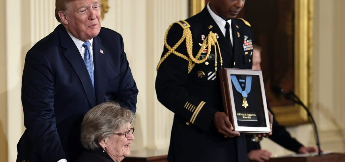 President Donald Trump with Pauline Conner, widow of 1st Lt. Garlin Conner, during a ceremony at the White House Tuesday. Trump presented the Medal of Honor posthumously to Conner for his actions in January 1945 during World War II.