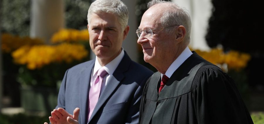 Justice Anthony Kennedy with Neil Gorsuch during Gorsuch's swearing-in ceremony at the White House on April 2017.