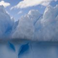 The texture and shapes of icebergs are caused by many different forces, such as the movement of water and air around and through the ice.