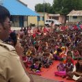 Harssh Poddar, a senior police official, addresses a village meeting at a rural school near Malegaon, in northern Maharashtra state. He warns families to be skeptical of what they read online. Earlier this month, Poddar helped rescue five people from being killed by a mob in his constituency.