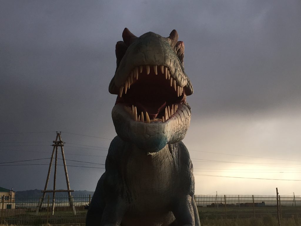 A fake dinosaur is a tourist attraction on the Silk Road in Mongolia.