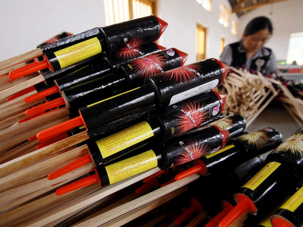 A worker assembles parts of a rocket firework at Southern Fireworks Manufacturer's factory in in 2008 in Liuyang, China, in Hunan province, Thursday June 19, 2008. Most American fireworks are imported from China. (AP Photo/Eugene Hoshiko)
