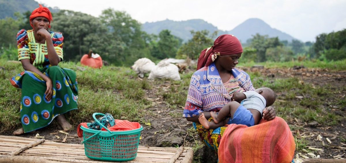 A woman breastfeeds her child in a village in the Democratic Republic of the Congo.