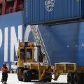 A shipping container is offloaded from the Hong Kong-based ship in Oakland, Calif., last month.