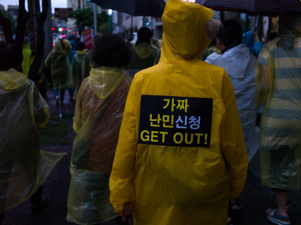 Residents of Jeju island take part in one of the country's protests against acceptance of Yemeni refugees. A larger protest took place last weekend in Seoul.