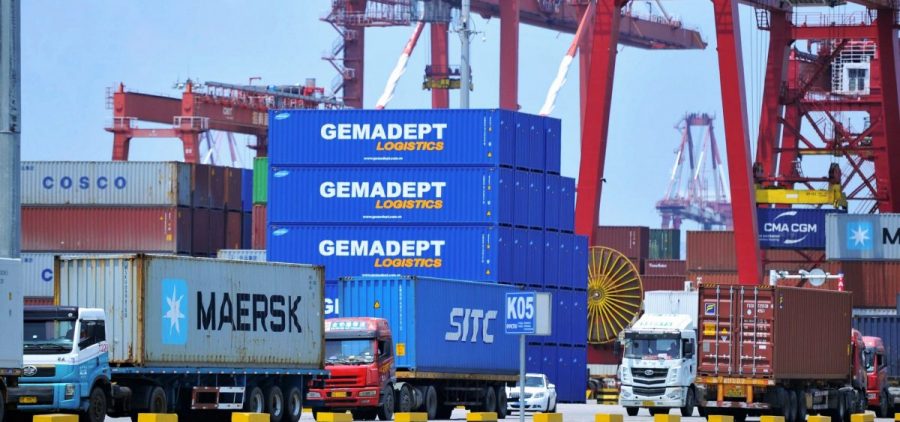 Containers are transferred at a port in Qingdao in China's eastern Shandong province last week. The Trump administration announced plans to levy tariffs on another $200 billion of Chinese goods as trade tensions escalate.
