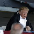 President Trump speaks while attending a briefing at Marine Corps Air Station Cherry Point in Havelock, N.C, on Wednesday, during a trip to visit areas impacted by Hurricane Florence. North Carolina Gov. Roy Cooper (let) and Homeland Security Secretary Kirstjen Nielsen (right) also attended the briefing.