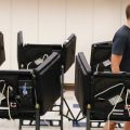 Voters cast their ballots in August among an array of electronic voting machines in a polling station at the Noor Islamic Cultural Center in Dublin, Ohio. The machines were manufactured by Elections Systems and Software, the largest manufacturer of voting equipment in the country.