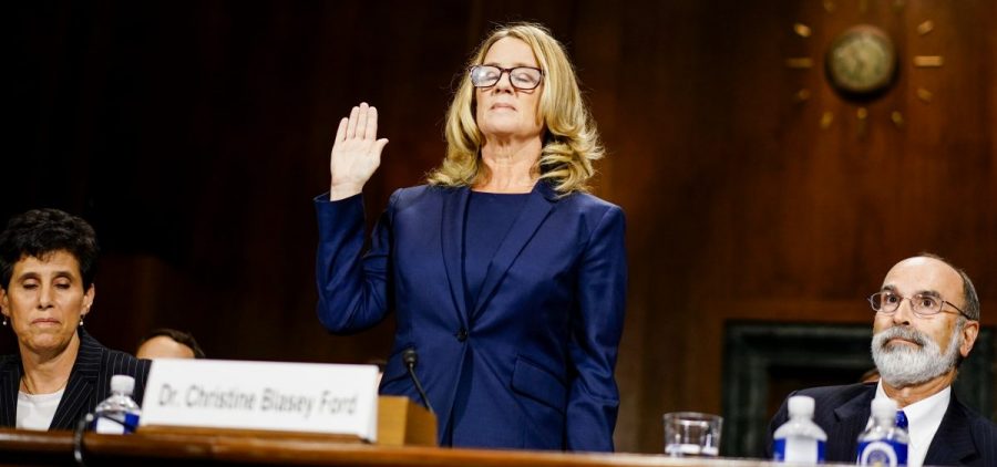 Kavanaugh accuser Christine Blasey Ford is sworn in before testifying Thursday at a confirmation hearing for the Supreme Court nominee.