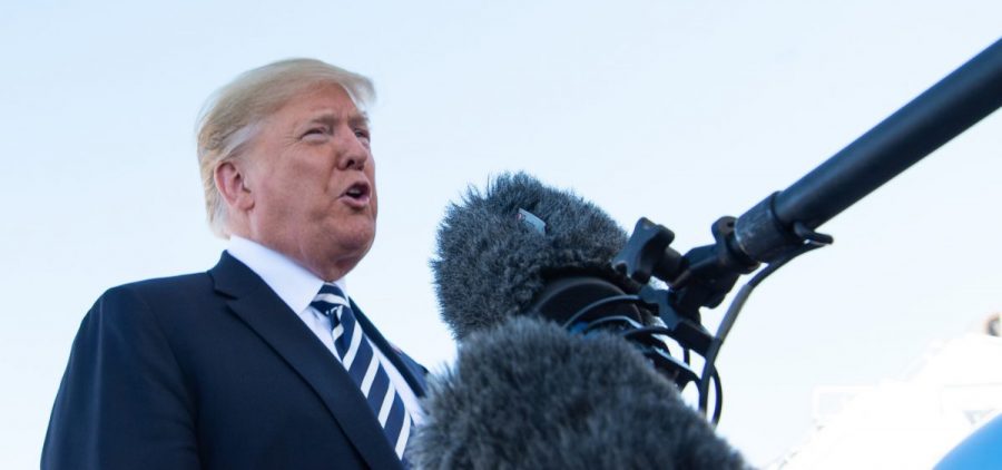 President Trump speaks to reporters before boarding Air Force One in Elko, Nev., Saturday. He said the U.S. would withdraw from a nuclear arms treaty with Russia and accused Russia of violating it.