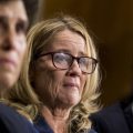 Christine Blasey Ford (center), flanked by attorneys Debra Katz and Michael Bromwich. The attorneys say that although Ford has tried to return to her life, she endures harassment.
