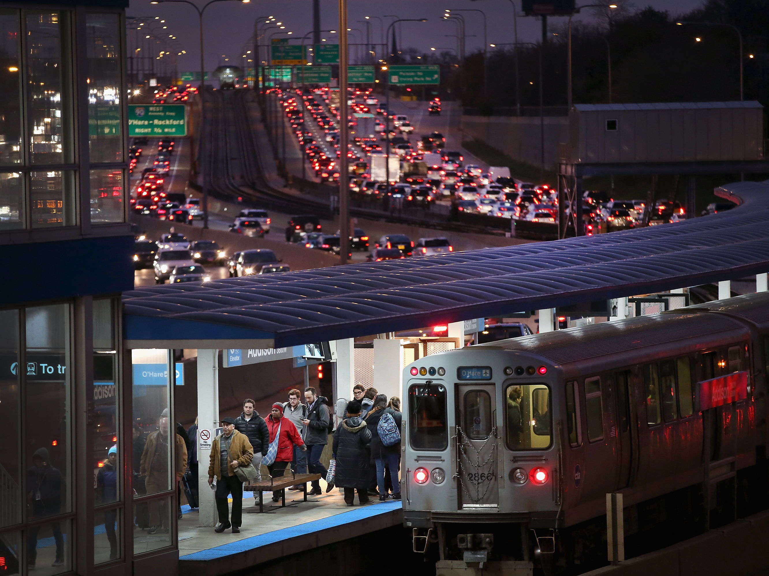 In Chicago, the Kennedy Expressway is clogged with cars as rush-hour commuters and Thanksgiving holiday travelers mix on Wednesday — one of the busiest travel days of the year.