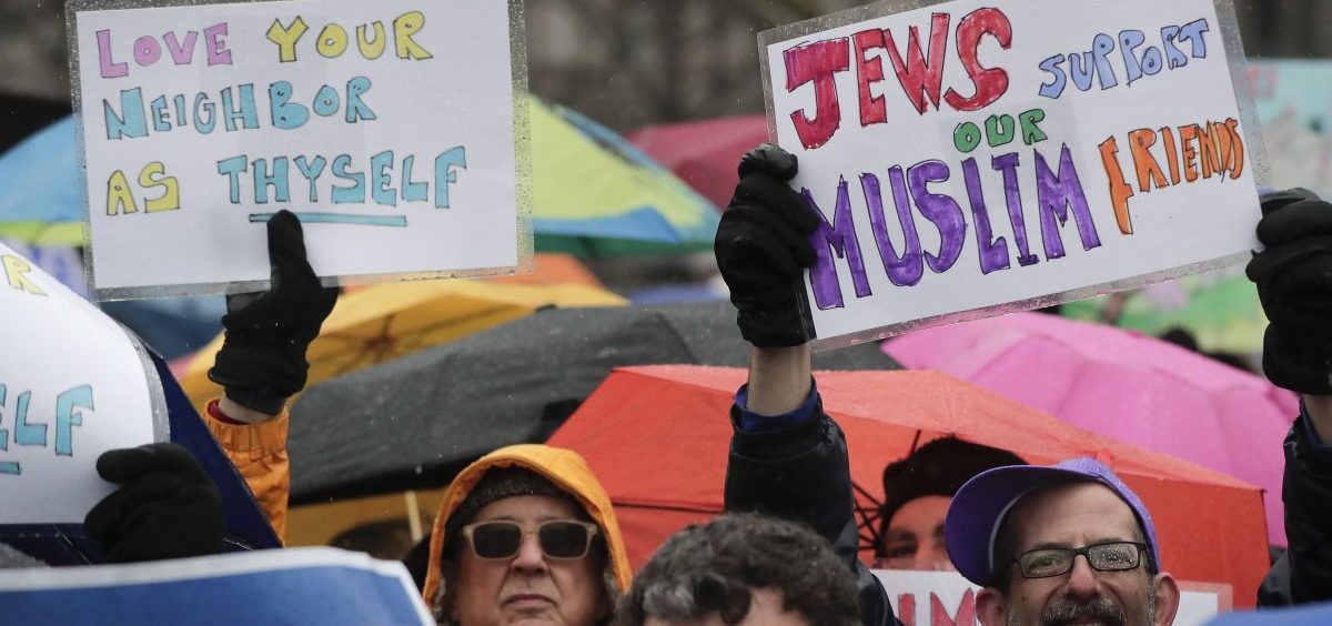 Demonstrators rally in New York City to mark a National Day of Jewish Action for Refugees in New York.