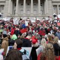 Thousands of public school teachers and their supporters protested against a pension reform bill at the Kentucky state Capitol in April. The state's Supreme Court has now struck down the law.