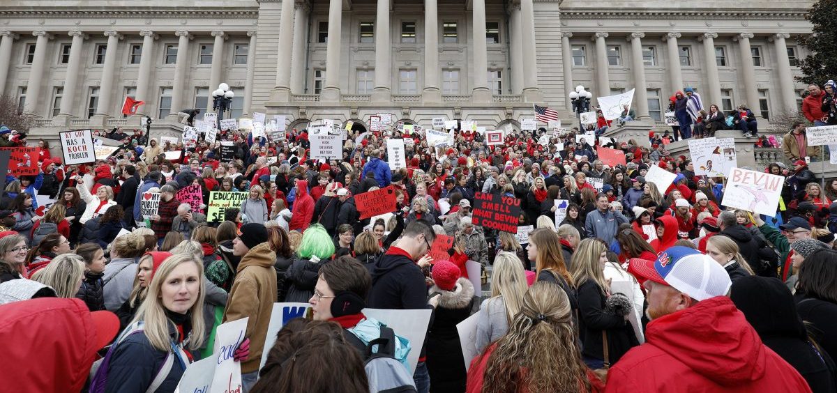Thousands of public school teachers and their supporters protested against a pension reform bill at the Kentucky state Capitol in April. The state's Supreme Court has now struck down the law.