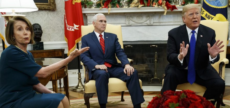 Vice President Mike Pence looks on as now-House Speaker Nancy Pelosi, D-Calif., argues with President Trump during a meeting in the Oval Office last month.