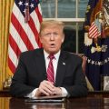 President  Trump speaks to the nation in his first televised address from the Oval Office of the White House on Tuesday in Washington, D.C.