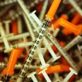Used syringes are discarded at a needle exchange clinic in Vermont in 2014. Americans' odds of dying from an opioid overdose have risen in recent years.