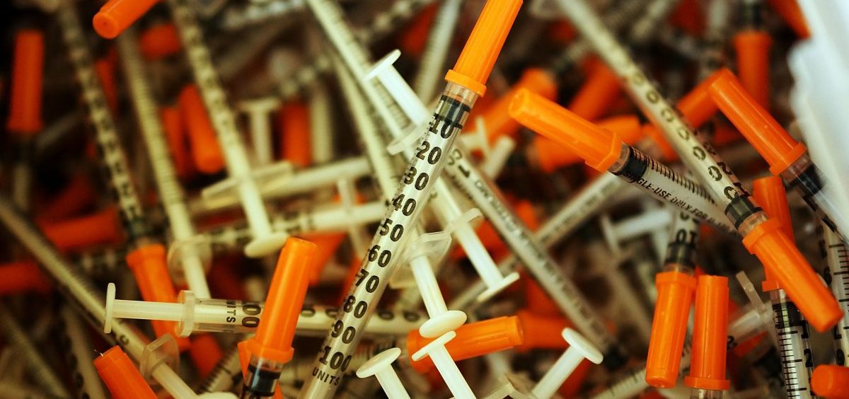 Used syringes are discarded at a needle exchange clinic in Vermont in 2014. Americans' odds of dying from an opioid overdose have risen in recent years.
