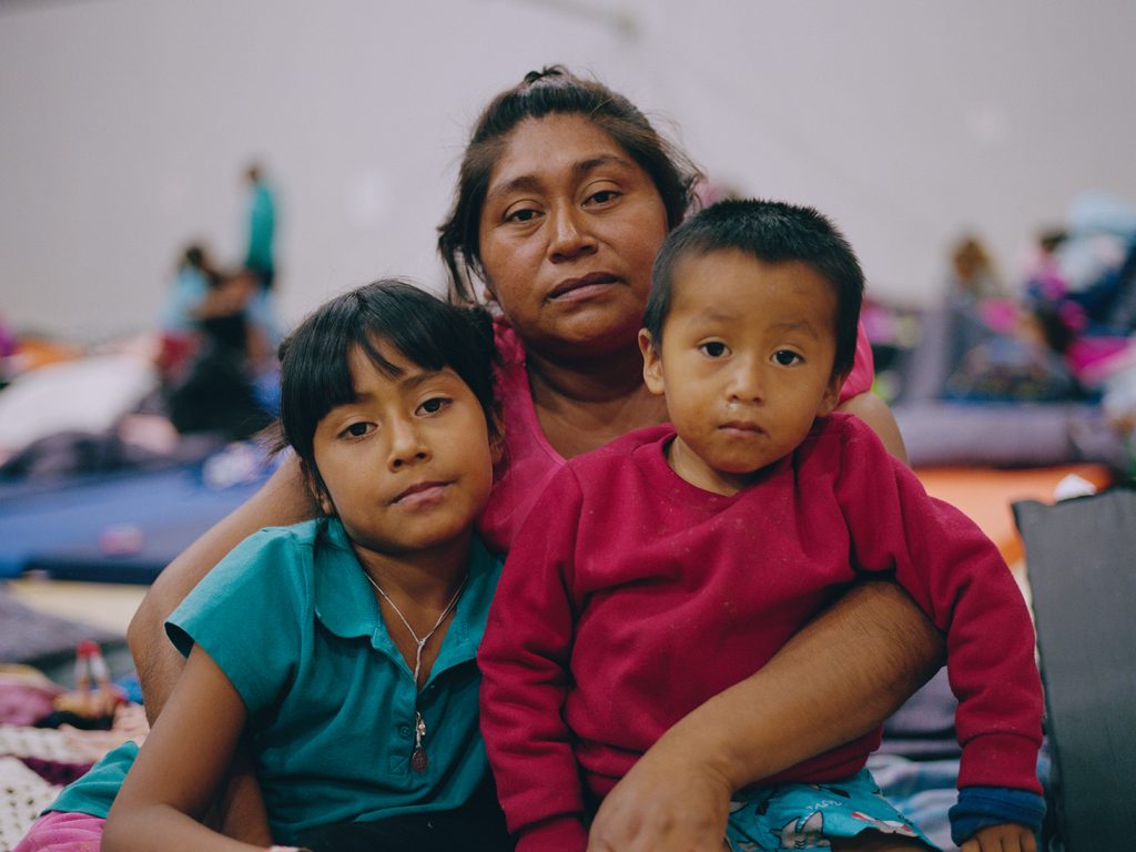 (Left) Maria Luisa Vasquez, 36, holds her children Brittany, 6, and César, 2. They are from Guatemala. (Right) Funny Gabriela Regalado, 20, is from Honduras. "I felt very scared to report this [abuse], because at the time he had some link to a [gang]; I did not want them to hurt my family or my children. So I kept quiet," Regalado said.