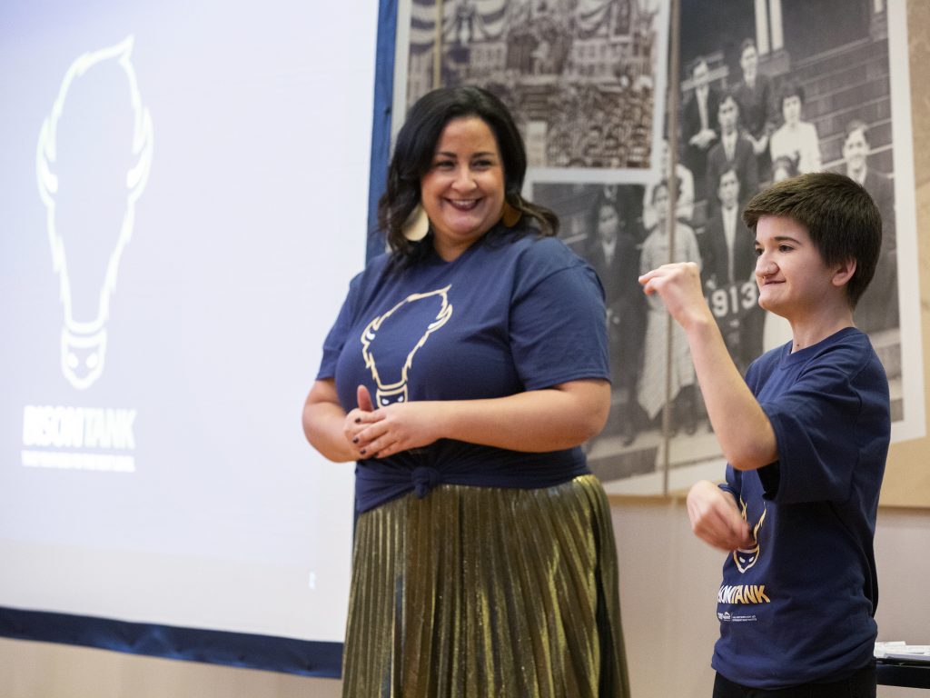 Melissa Yingst (left) and Breannah Medina give opening remarks at Gallaudet University's Bison Tank contest, a college version of the popular TV show Shark Tank, in Washington, D.C.