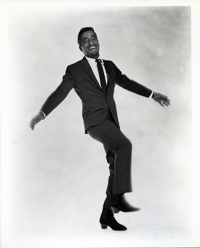Sammy Davis, Jr. kicks it up in a photo from the documentary 