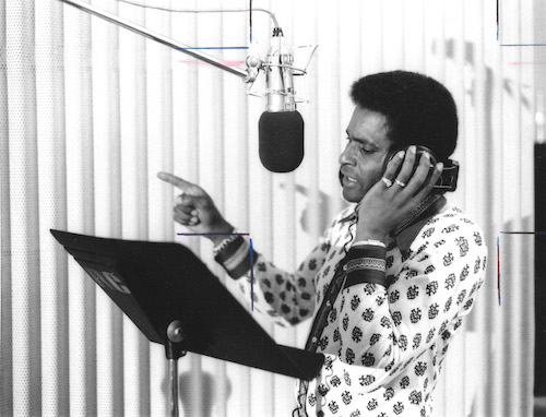 Charley Pride circa 1960's singing into studio microphone