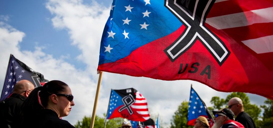 The National Socialist Movement, a neo-nazi group that has been designated a hate group by the Southern Poverty Law Center, held a rally in Newnan, Ga., in April 2018.