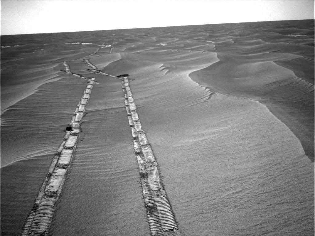 NASA's Opportunity rover used its navigation camera to capture this northward view of tracks in May 2010 during its long trek to Mars' Endeavour crater.