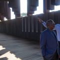 Henry Louis Gates, Jr., executive producer and host of Reconstruction: America After the Civil War, and Bryan Stevenson, founder and executive director of the Equal Justice Initiative, walk through the National Memorial for Peace and Justice in Montgomery, AL.