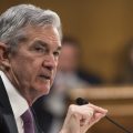Federal Reserve Chairman Jerome Powell testifies before the Senate Banking Committee on Feb. 26. "It may be some time before the outlook for jobs and inflation calls clearly for a change in policy," he said Wednesday.