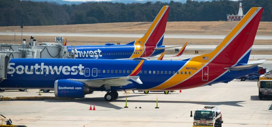 A Boeing 737 Max 8 flown by Southwest Airlines sits at the gate at Baltimore Washington International Airport on Wednesday. "The grounding will remain in effect pending further investigation, including examination of information from the aircraft's flight data recorders and cockpit voice recorders," the FAA said in a statement.