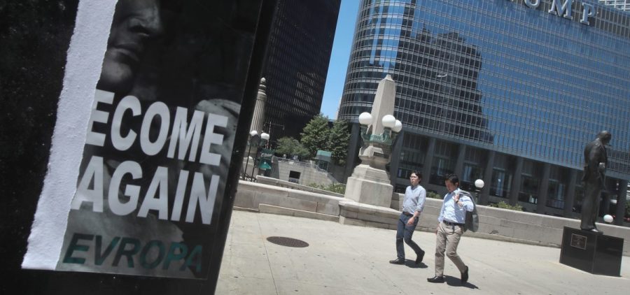 A defaced recruiting flyer for Identity Evropa hangs near Trump Tower in Chicago, in July 2016. The flyer which read "Let's Become Great Again" was part of a 17-city recruitment effort by the white nationalist organization.