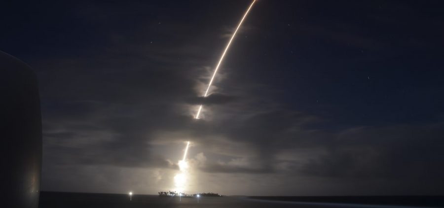 A missile carrying a dummy warhead was fired from Kwajalein Atoll in the Pacific. It was intercepted by two defensive missiles fired from the California coast.