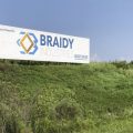 This Aug. 22, 2018, file photo shows a sign declaring the future home of Braidy Industries' aluminum mill in Ashland, Ky.