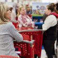 Shoppers wait in line at a Target store in Newport, Ky., on Nov. 29, 2018. Strong consumer spending boosted analysts' economic growth forecasts for the first quarter of 2019.