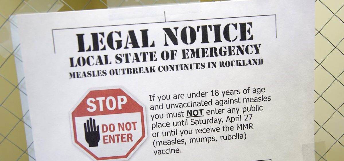 A sign explaining the local state of emergency because of a measles outbreak at the Rockland County Health Department in Pomona, N.Y.