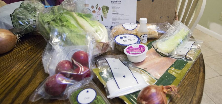 While it may seem that heaps of plastic from meal kit delivery services like Blue Apron make them less environmentally friendly than traditional grocery shopping, a new study says the kits actually produce less food waste.