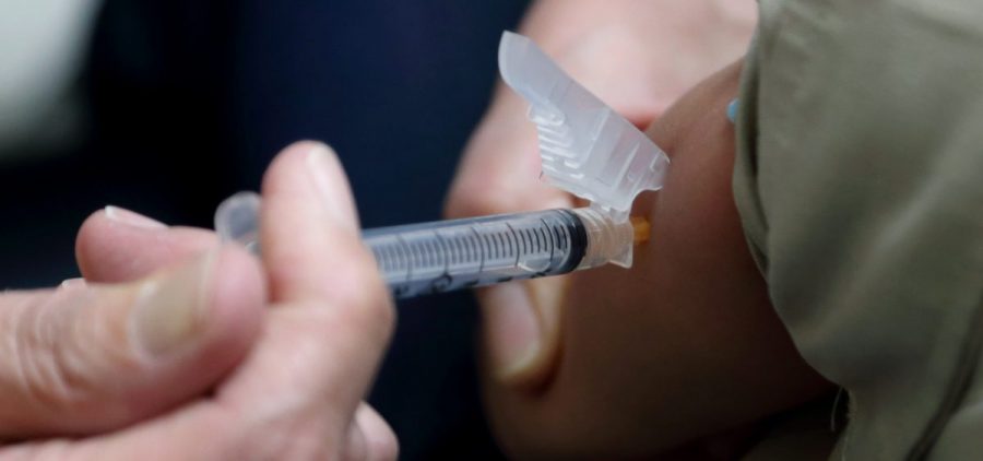 New York eliminated a religious exemption to vaccine requirements Thursday in the face of the nation's worst measles outbreak in decades.