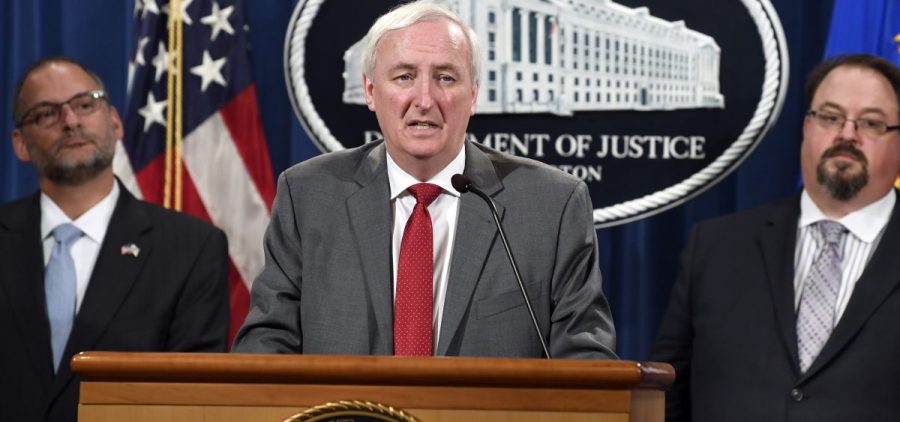 Deputy Attorney General Jeffrey Rosen with Hugh Hurwitz, left, acting director of the Bureau of Prisons, and David Muhlhausen, director of the National Institute of Justice, at DOJ in Washington.