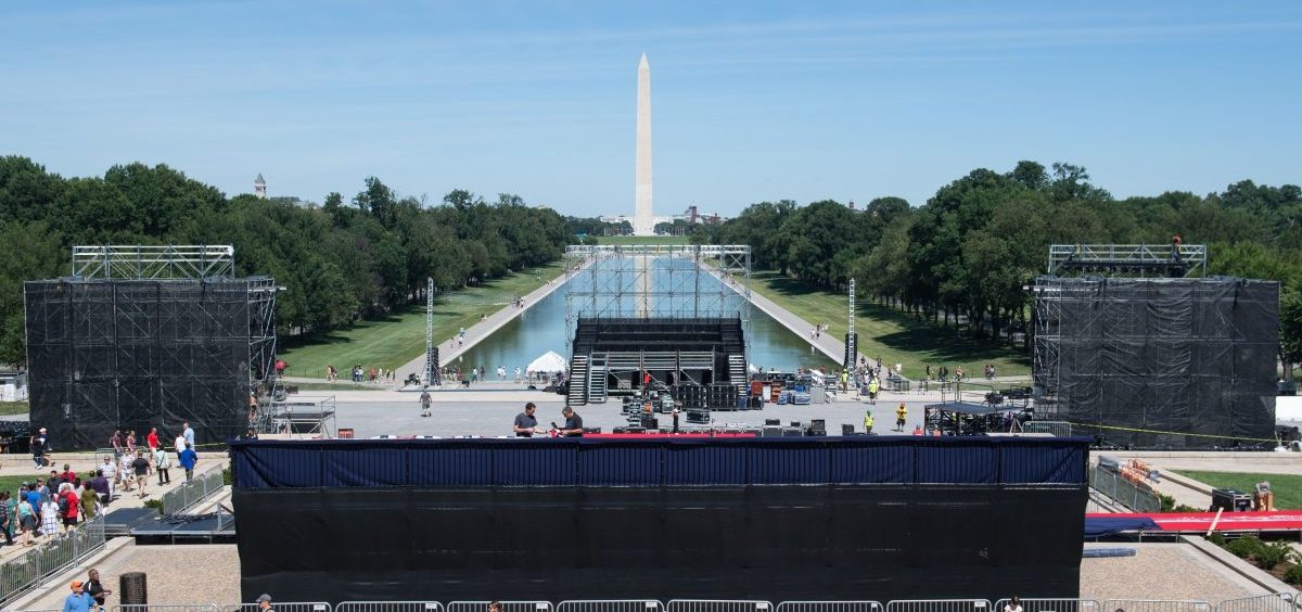 Workers build a stage and bleachers Monday for the "Salute to America" Fourth of July event with President Trump at the Lincoln Memorial on the National Mall.