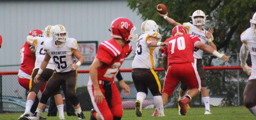 Western Brown quarterback launches a pass