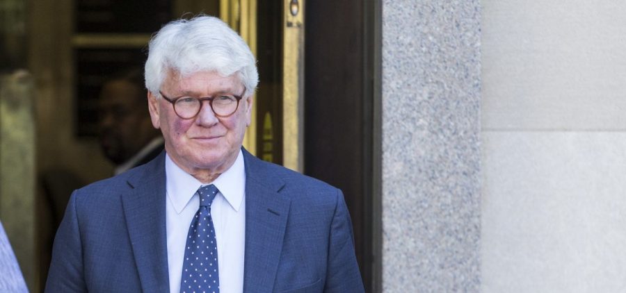 Greg Craig, who was White House counsel under President Barack Obama, departs from the U.S. District Courthouse after a hearing on April 15. His trial begins Monday.