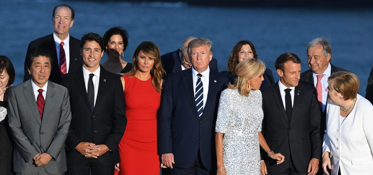 World leaders gather for a group photo at the G-7 summit in Biarritz, France, on Sunday. Summit host and French President Emmanuel Macron and President Trump are holding a joint press conference on Monday.