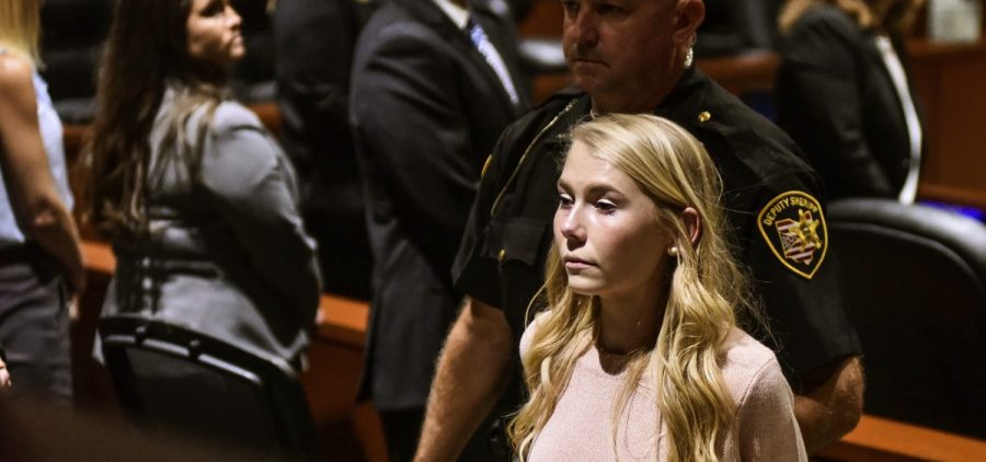 Brooke "Skylar" Richardson is escorted out of the courtroom after the verdict